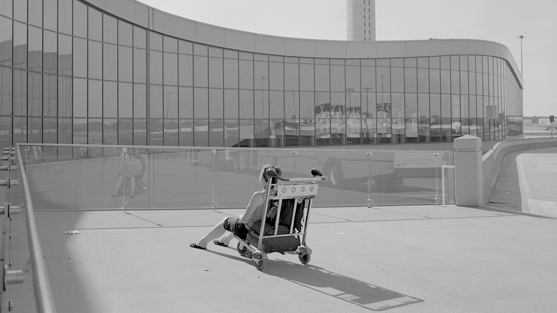 Stolen Moments of Solitude at the World’s Busiest Airport | The New Yorker