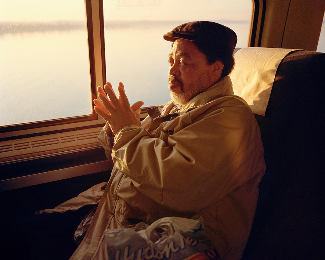 McNair Evans photographs Amtrak riders in his exhibition “In Search of Great Men.”