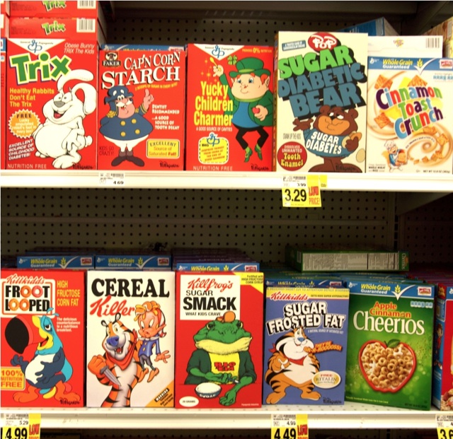 Ron English Parody Cereal Boxes Placed on Grocery Store Shelves